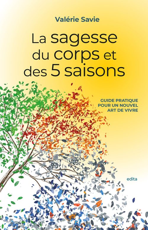 Un seul arbre avec des feuilles de toutes les couleurs des saisons
